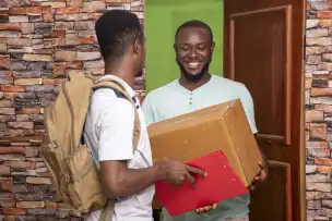 Courier holding an important document envelope for secure delivery
