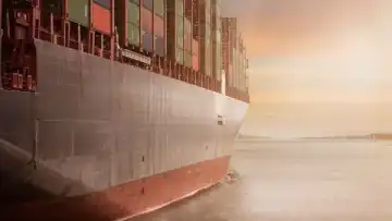 Cargo container ship at port for sea freight transportation